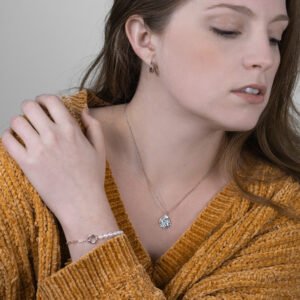 Romantic link, Lalaif necklace in silver, and Simple Huggie earrings