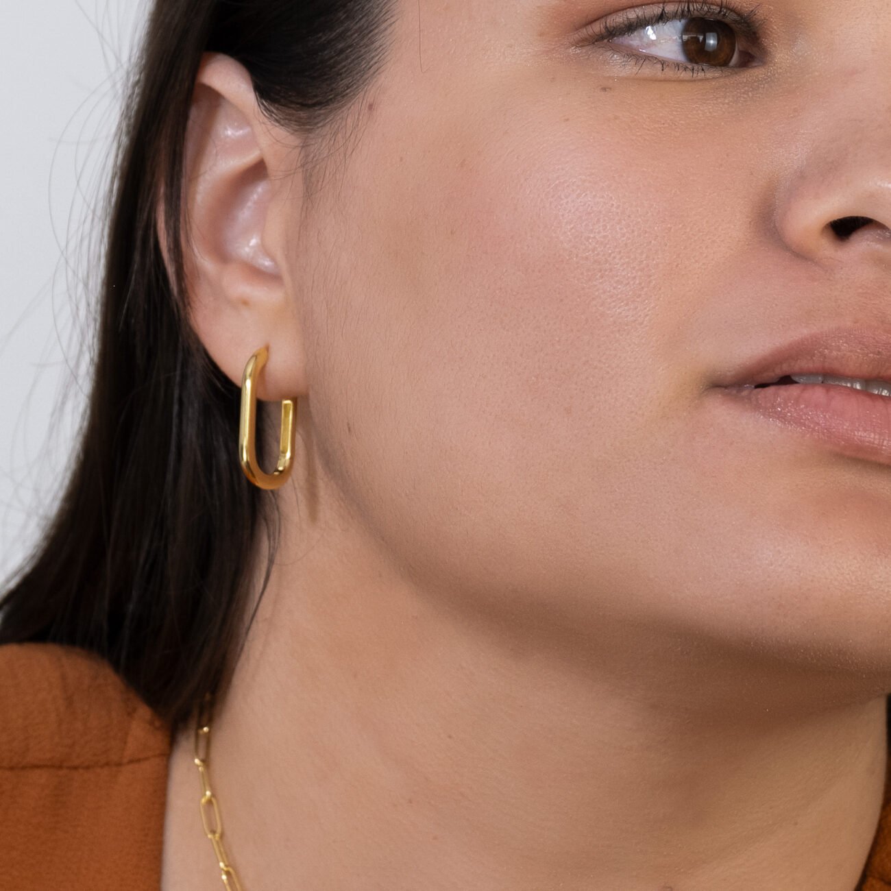 clip earrings gold on model